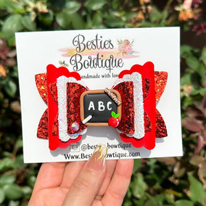 A B C Red 4” Glitter Bow with Clay Center